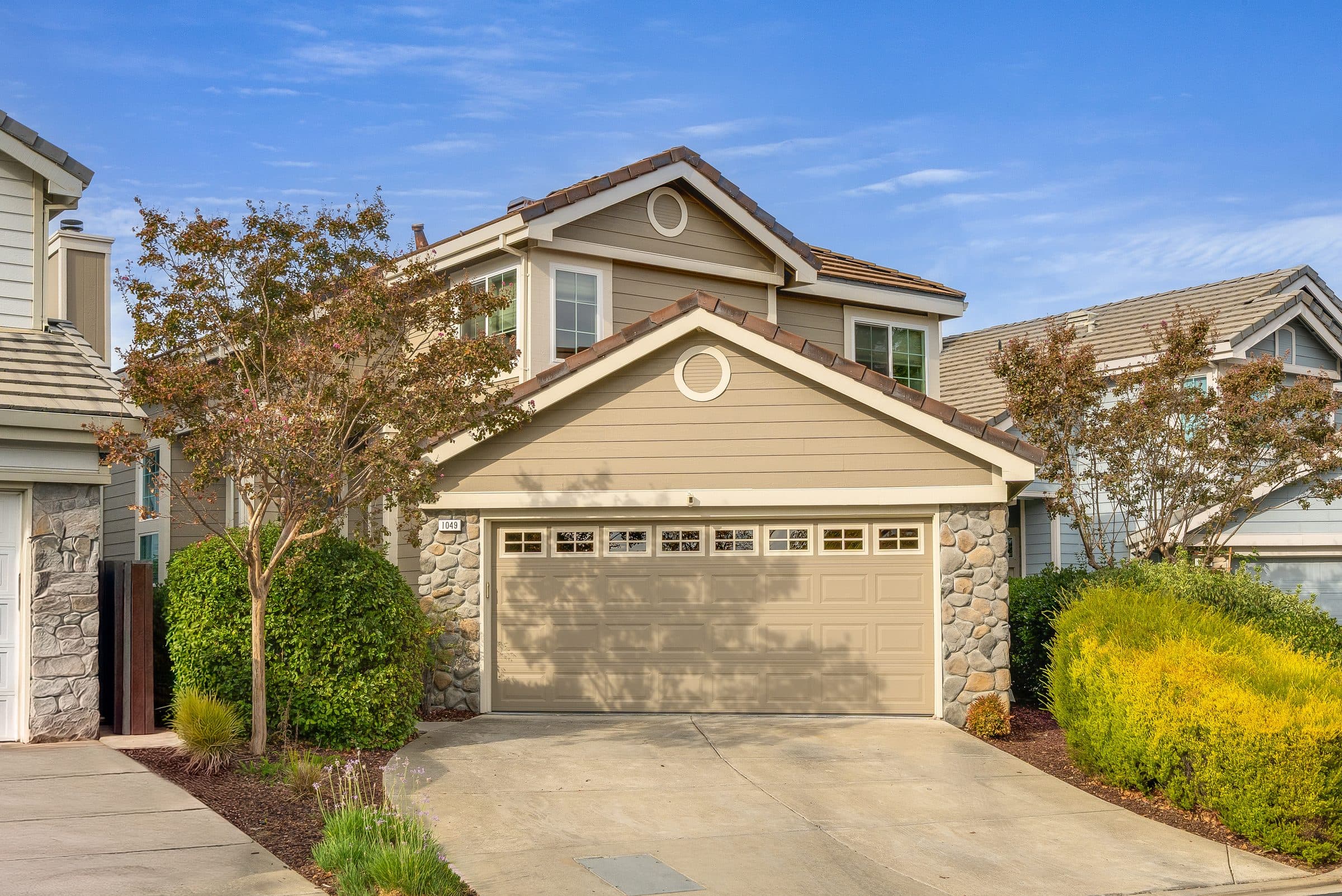 1049 Feather Circle. The front of the house and its attached two-car garage.