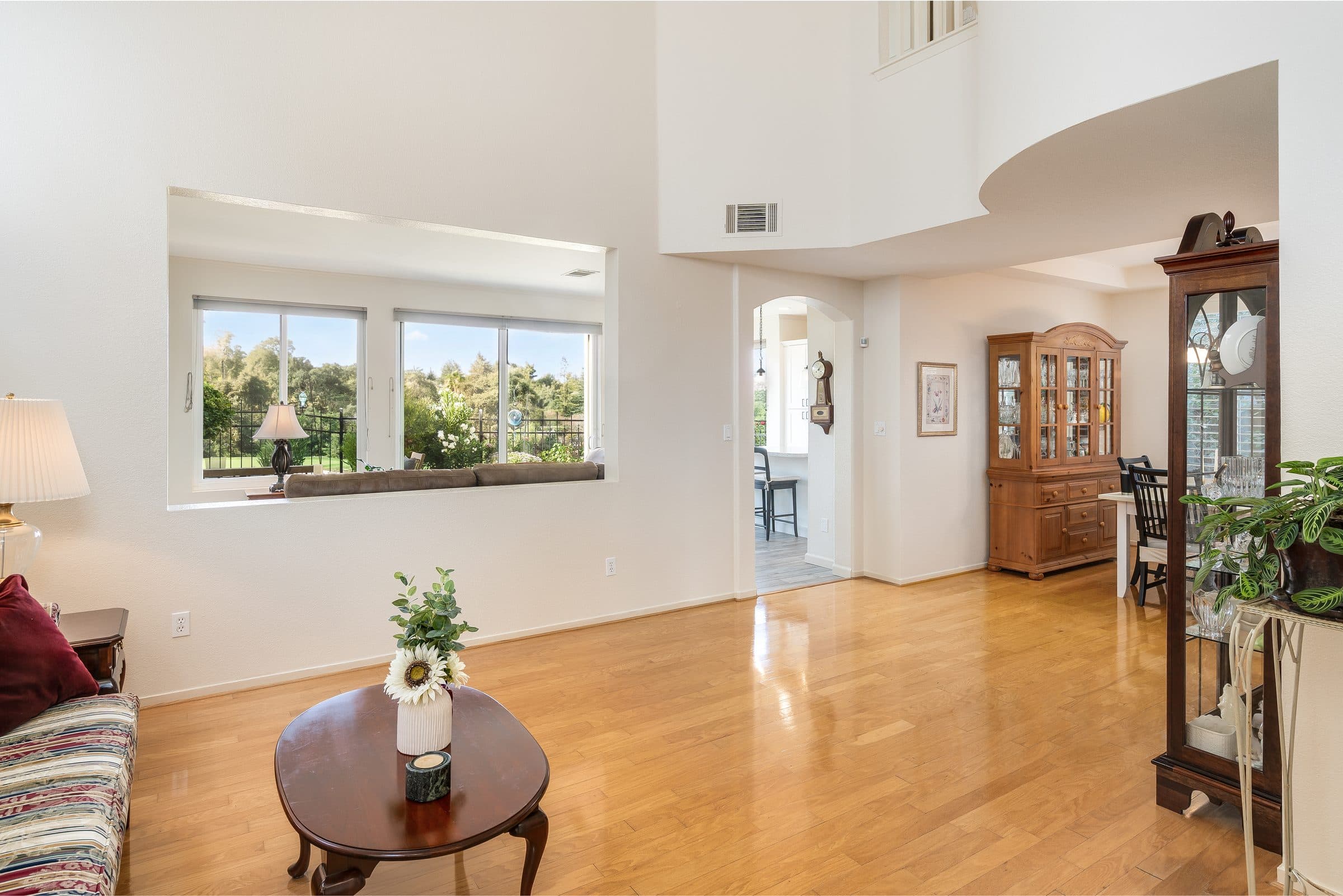 1049 Feather Circle. The living room, with a view through to the course.