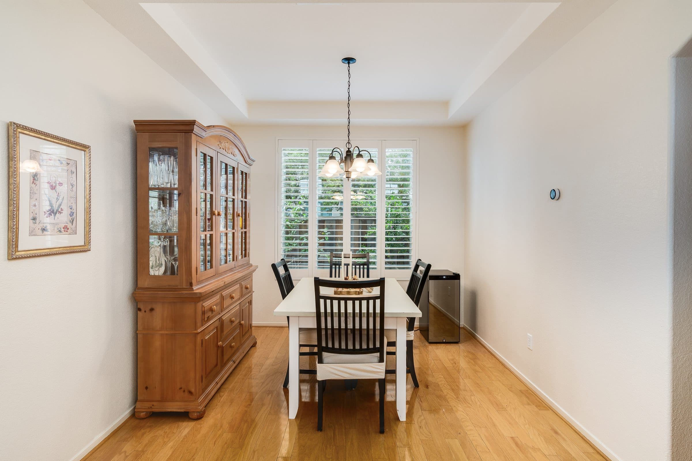 1049 Feather Circle. The dining area, beneath a chandelier.