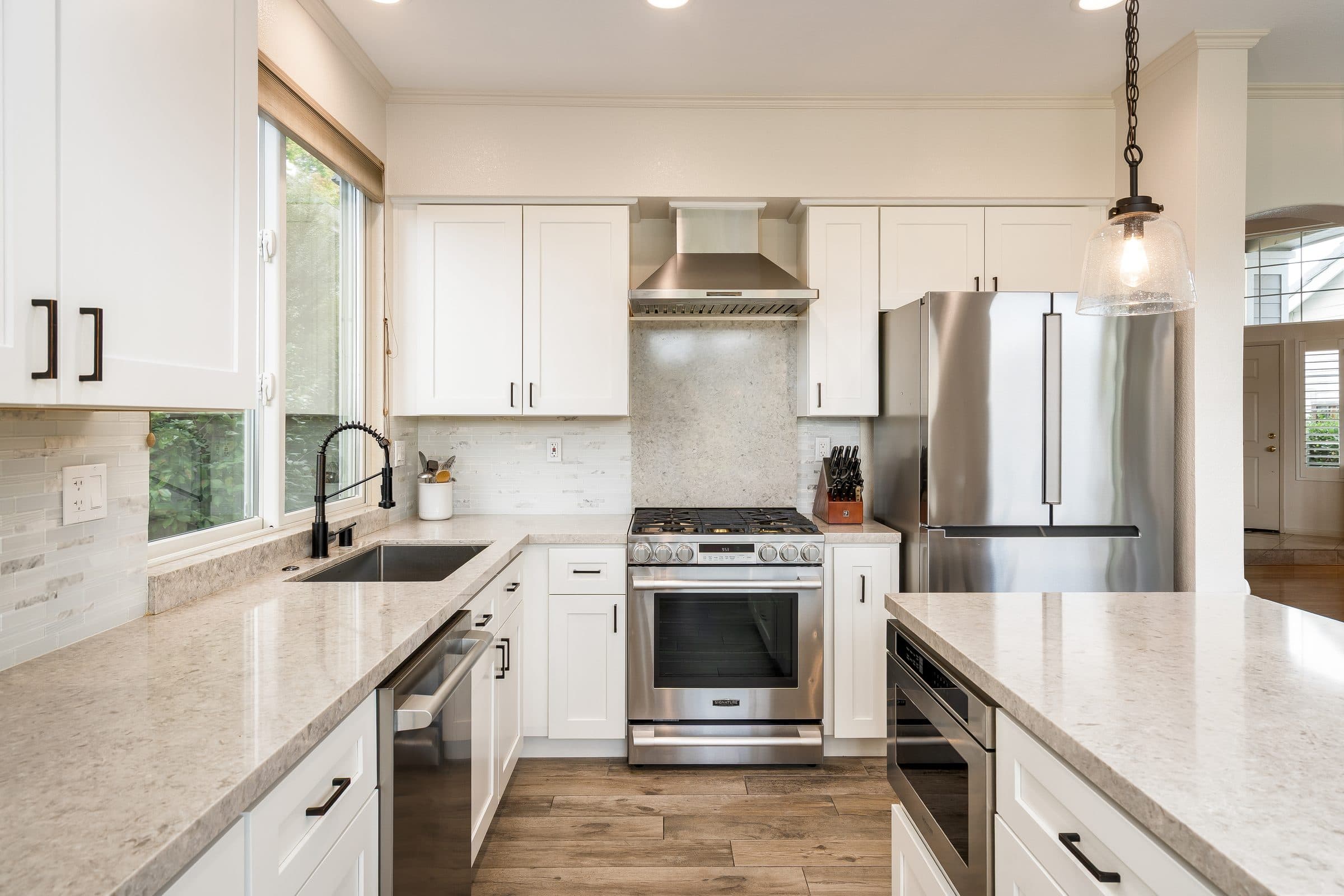 1049 Feather Circle. The kitchen sink and gas range.