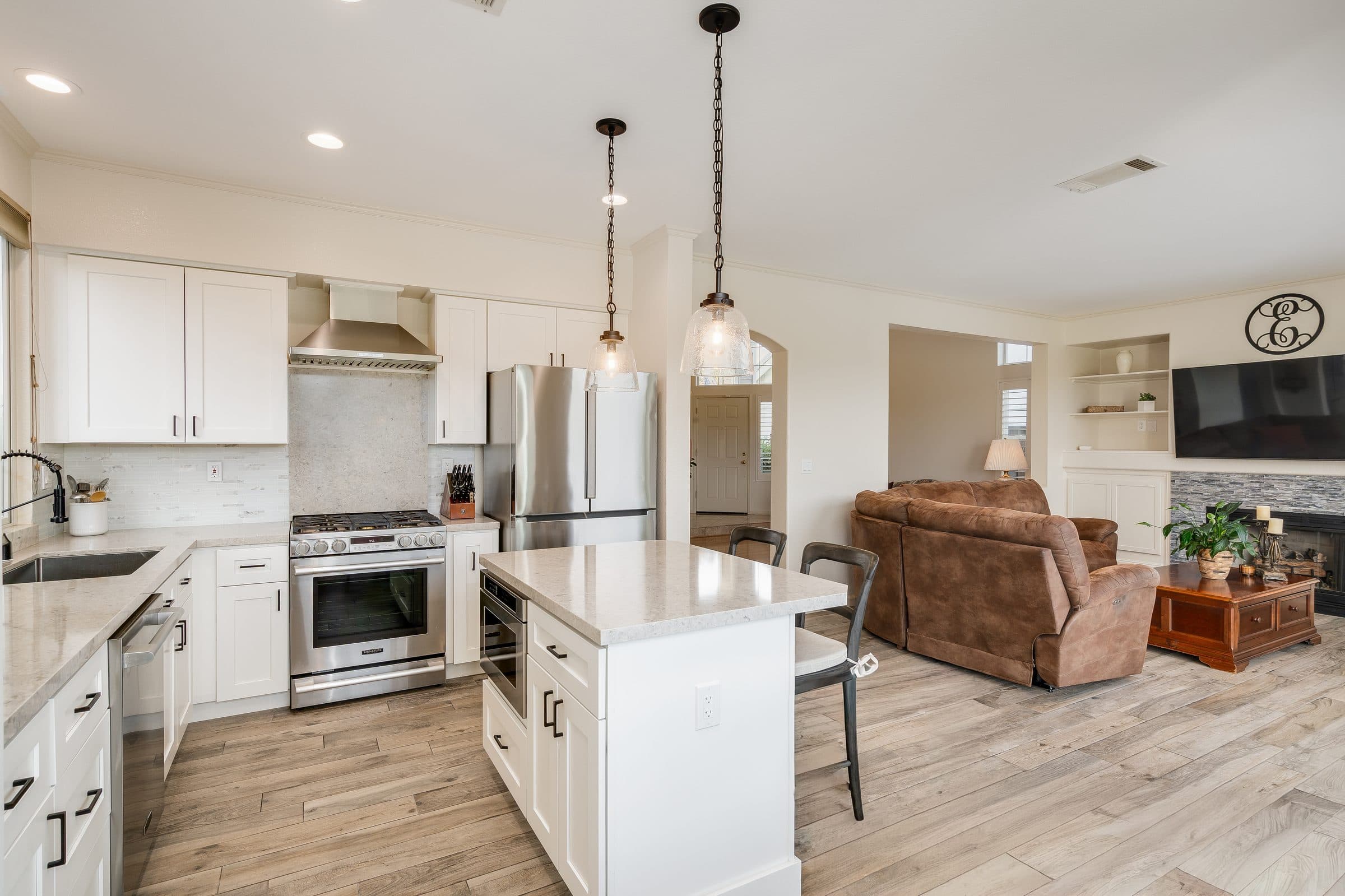 1049 Feather Circle. The kitchen and the family room beyond.