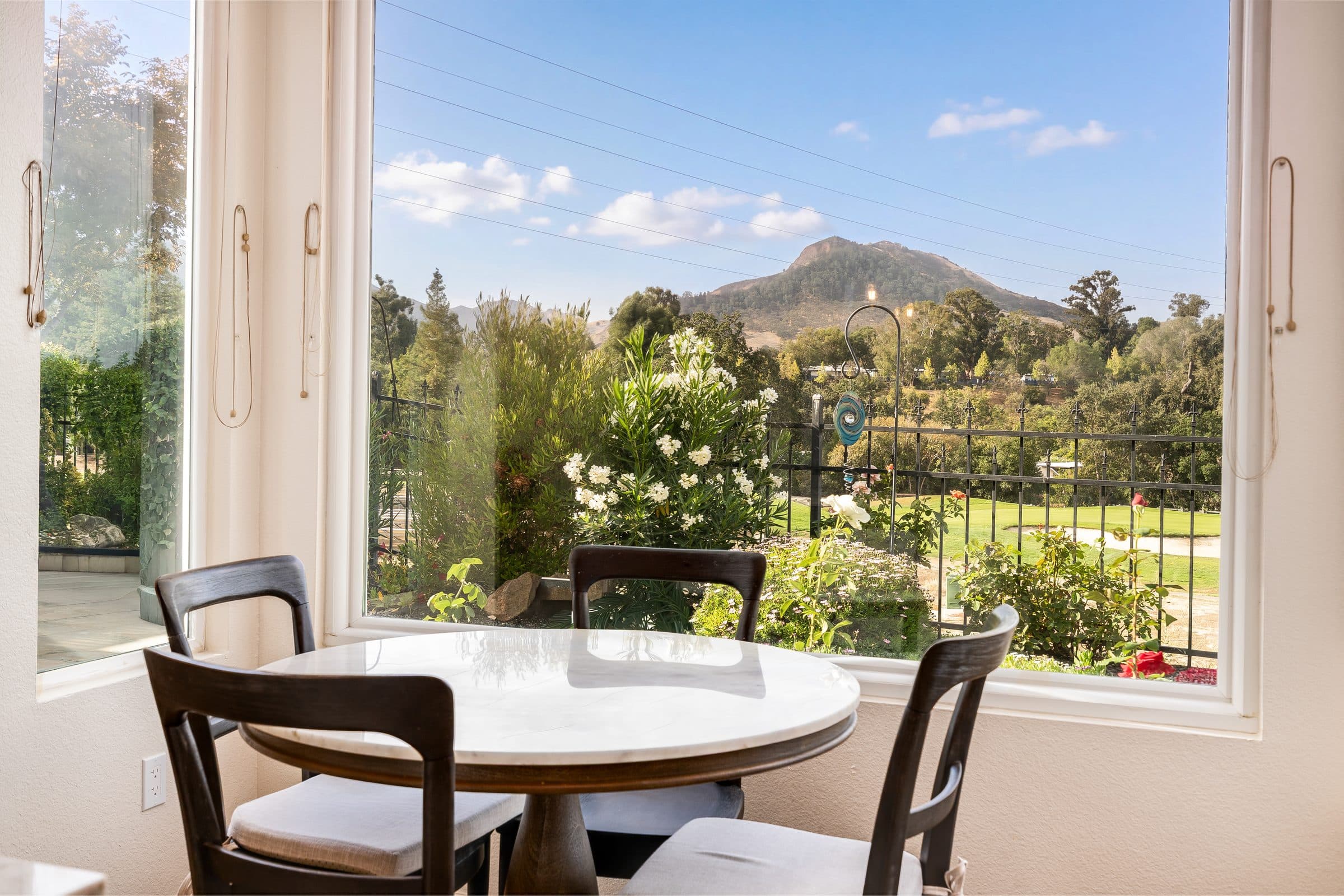 1049 Feather Circle. The breakfast table, with Mount Diablo framed in the window.