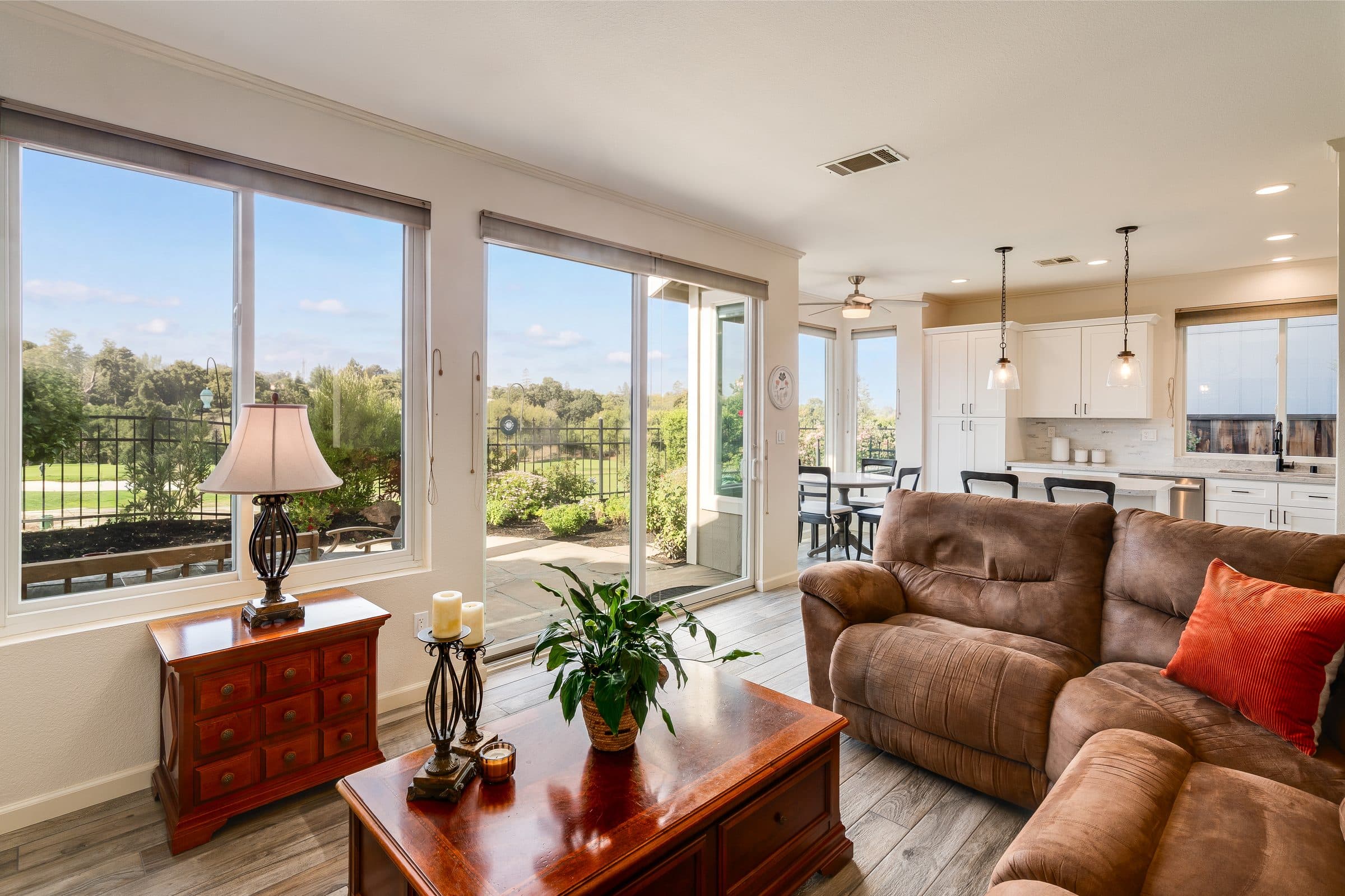 1049 Feather Circle. The family room, with sliding doors to the patio and course.