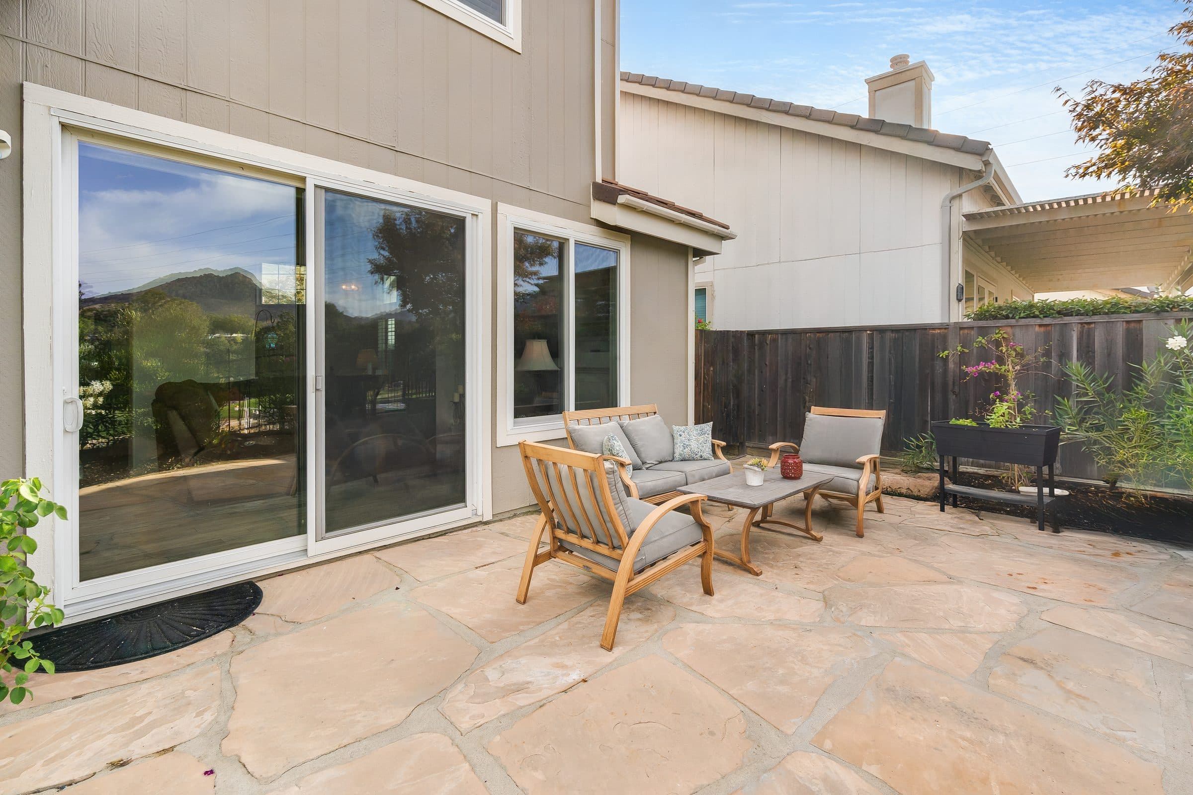 1049 Feather Circle. The stone patio off the family room.