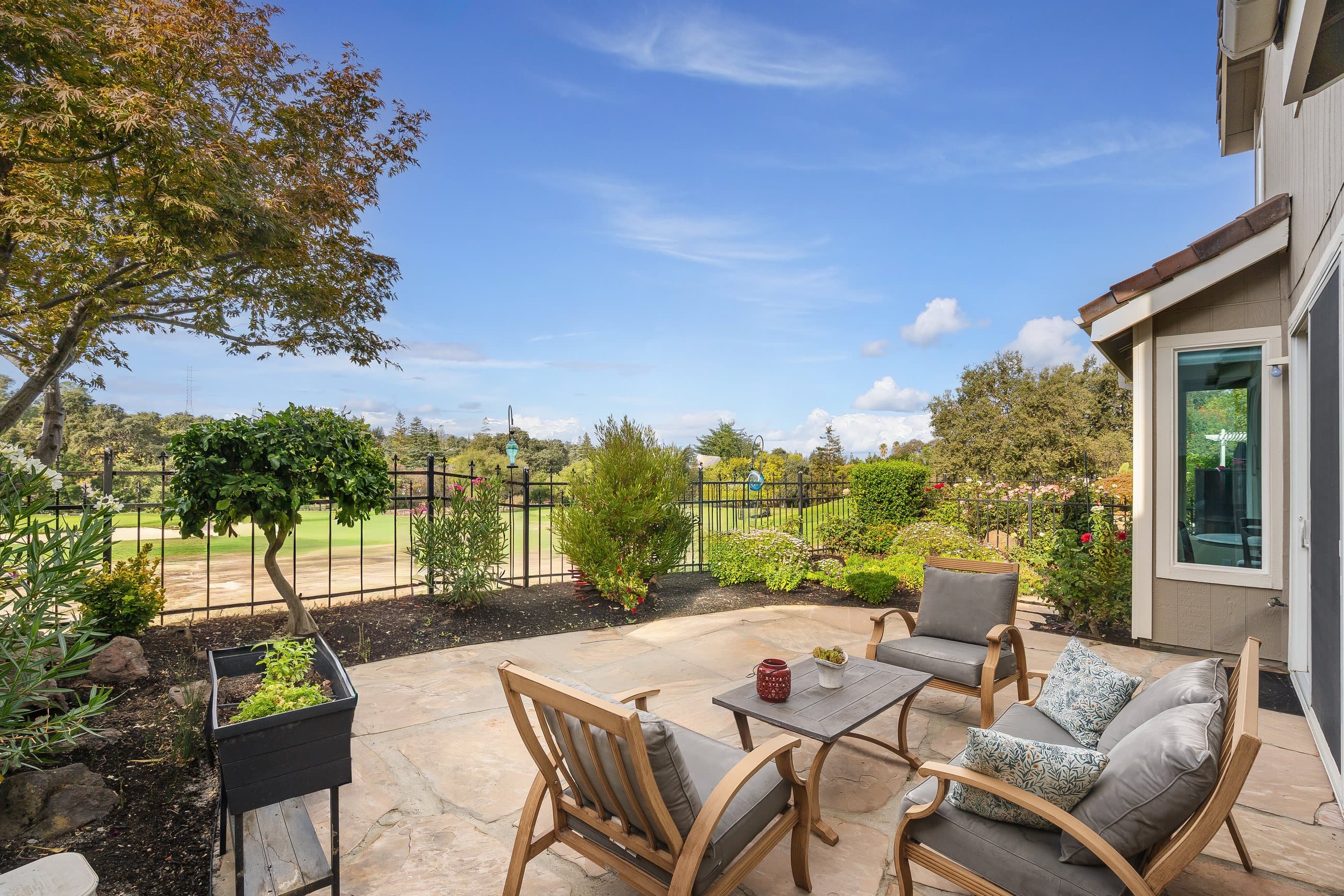 The patio at 1049 Feather Circle, looking out over the golf course to the hills.