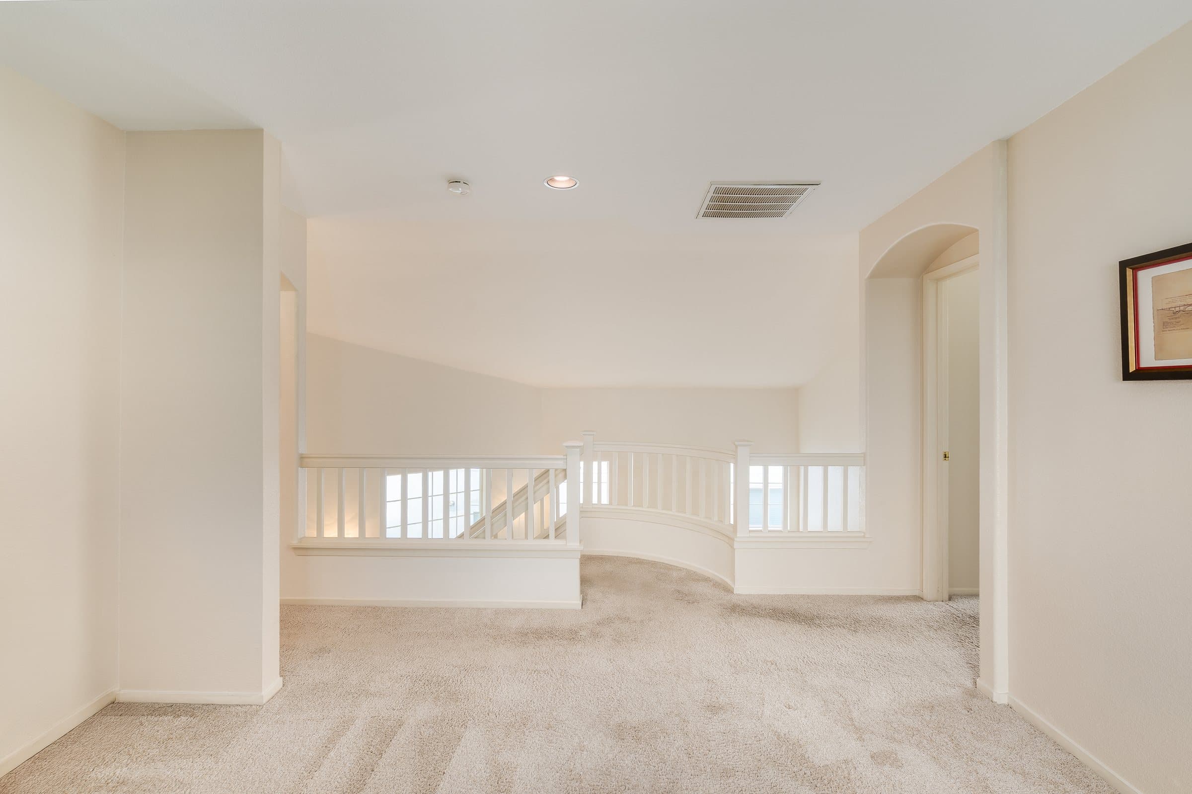 The upstairs loft at 1049 Feather Circle, open to the living room below.