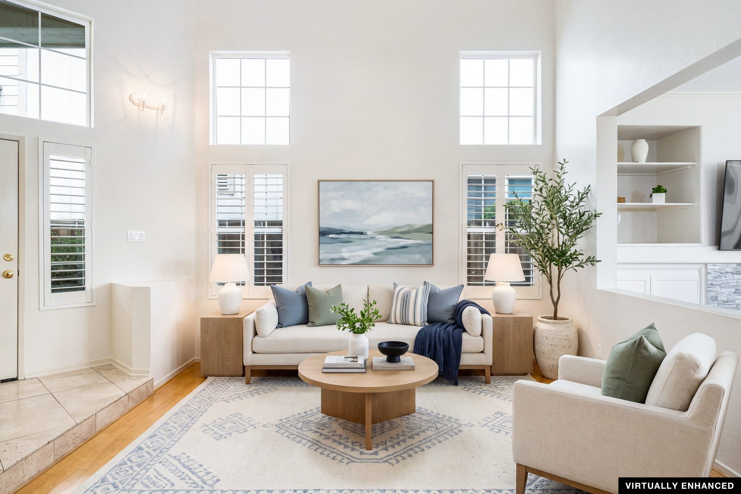 The same living room virtually staged with modern furnishings. Virtually enhanced.